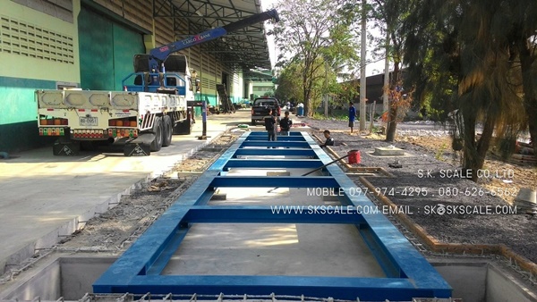 ติดตั้งเครื่องชั่งรถบรรทุกแบบแท่นบ่อเสมอพื้น ขนาด 3x18 เมตร