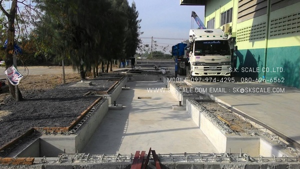 ติดตั้งเครื่องชั่งรถบรรทุกแบบแท่นบ่อเสมอพื้น ขนาด 3x18 เมตร